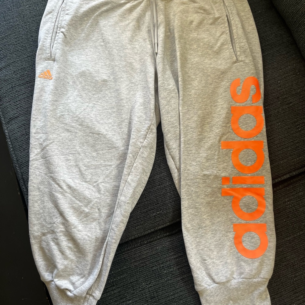 Adidas Light Gray Joggers with Bright Orange Logo